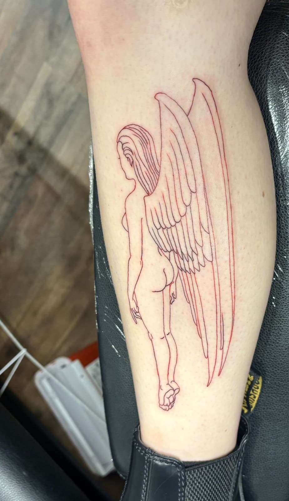 angel leg tattoo by Taetyn Panagos