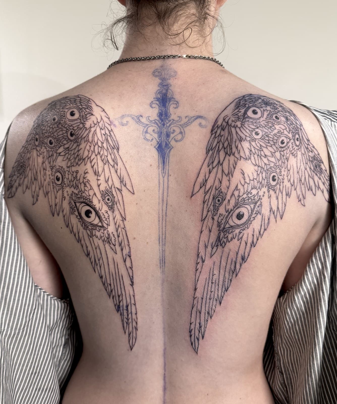 back wings tattoo by Taetyn Panagos