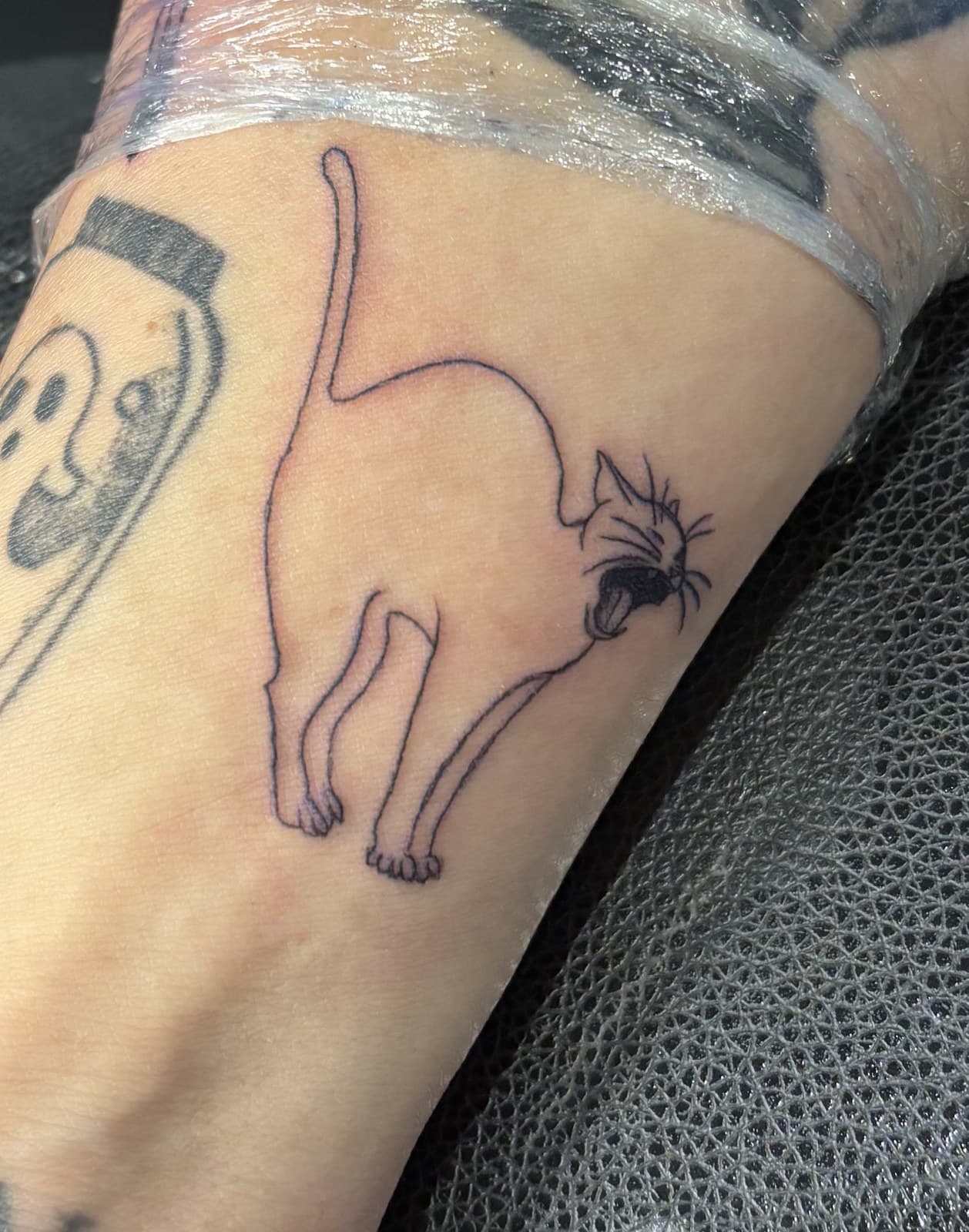 cat gramophone tattoo by Taetyn Panagos