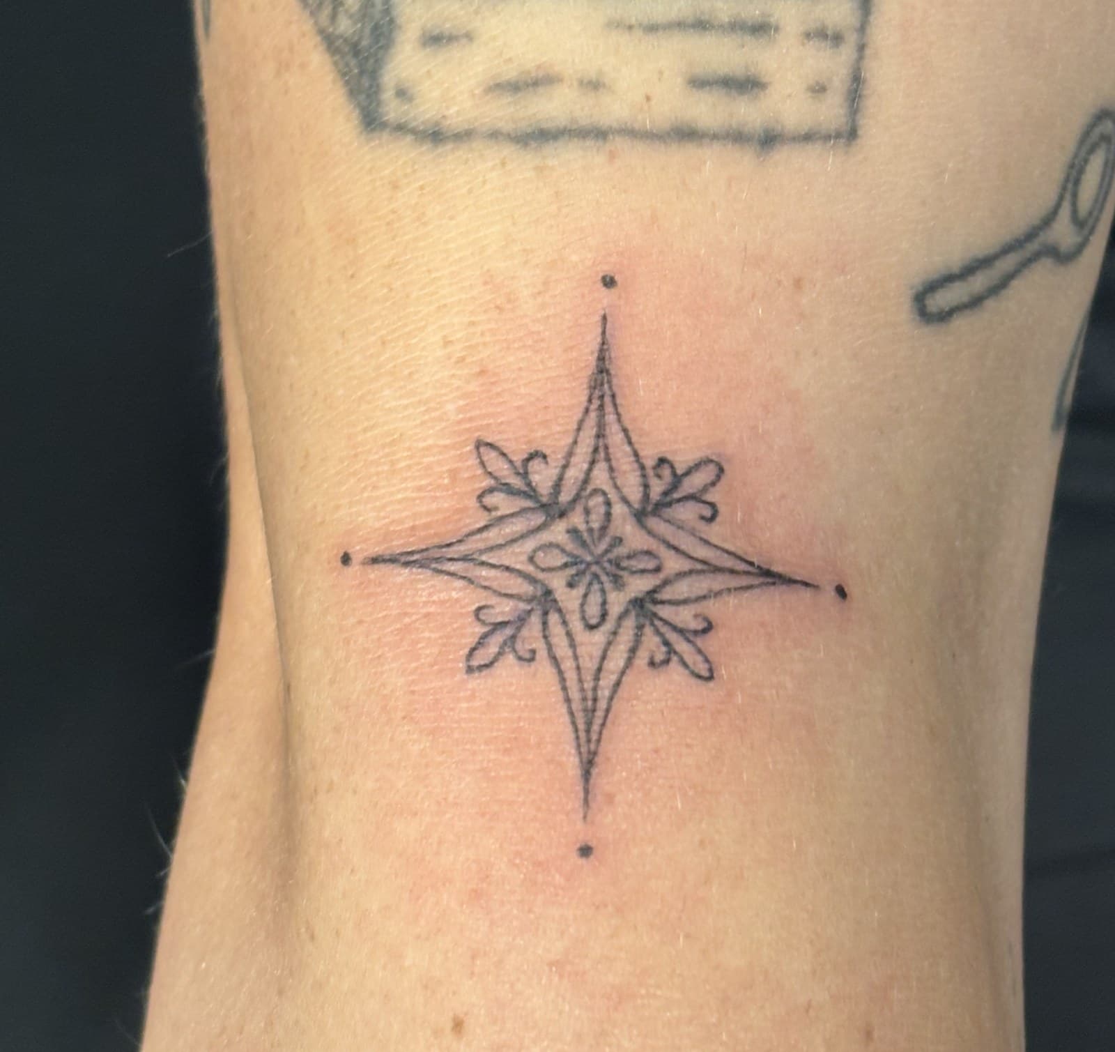 compass forearm tattoo by Taetyn Panagos