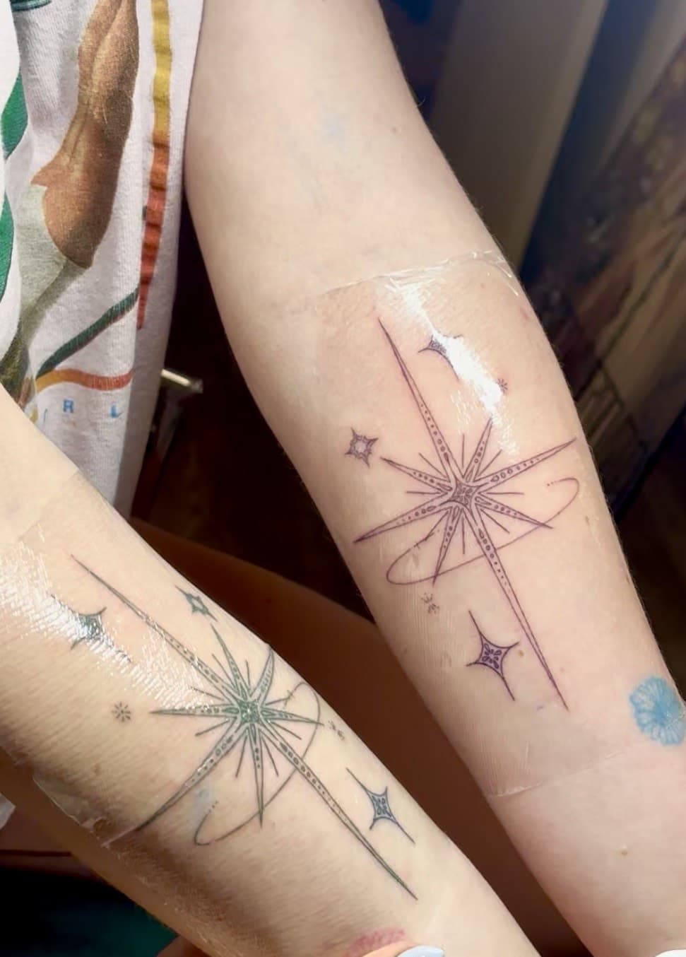sparkle cluster arm tattoo by Taetyn Panagos