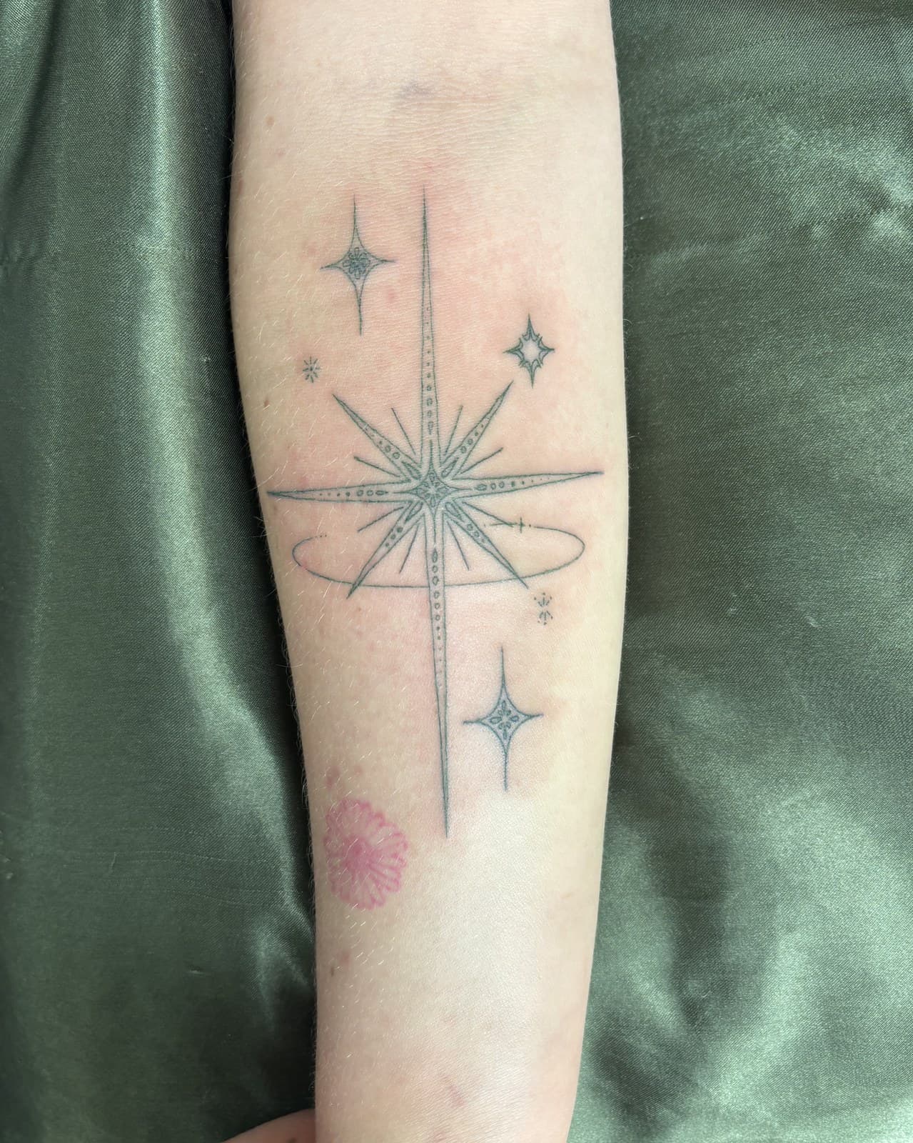 star forearm tattoo by Taetyn Panagos