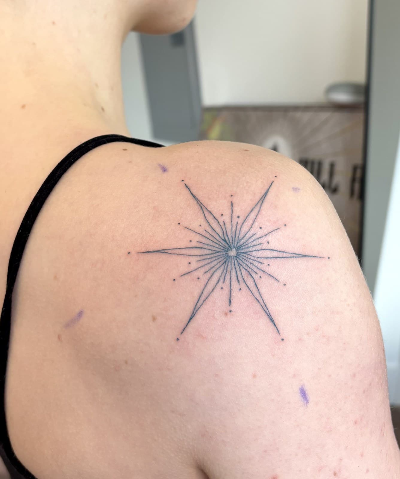 starburst shoulder tattoo by Taetyn Panagos