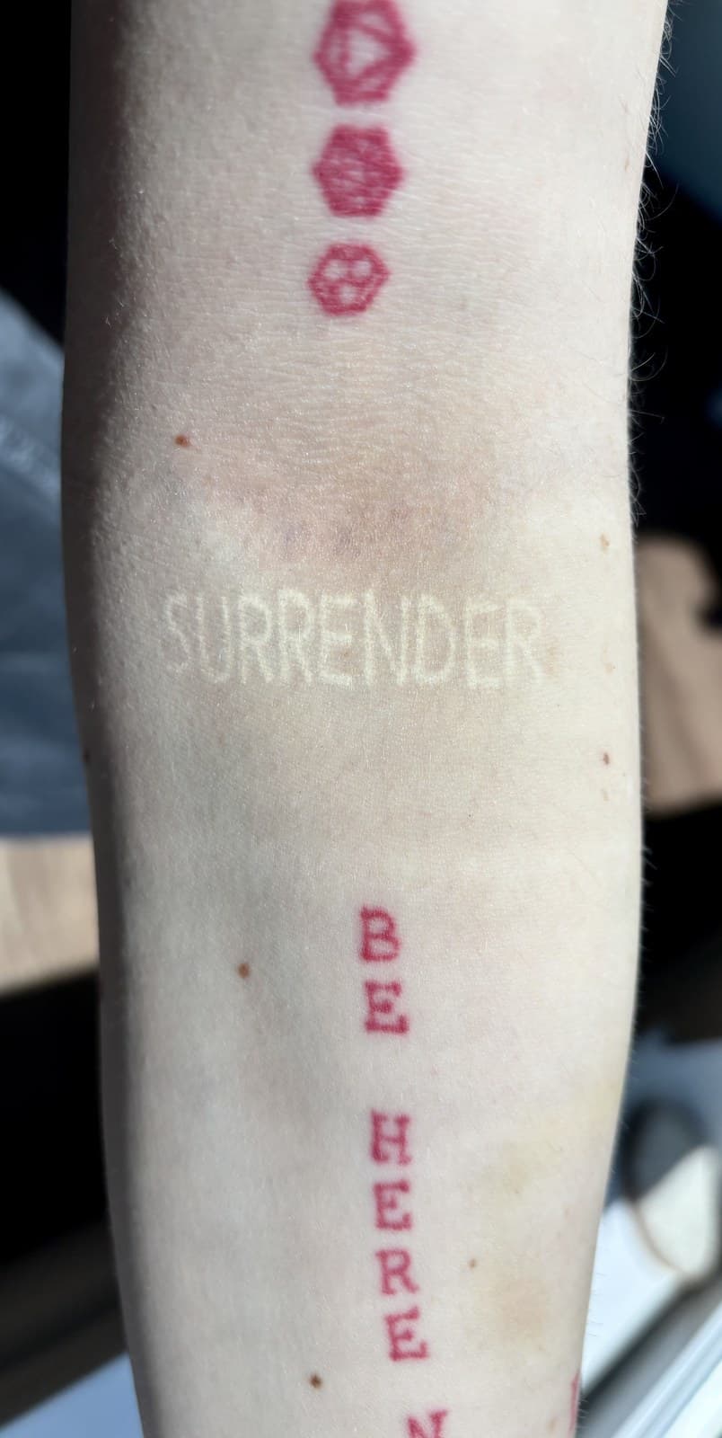 surrender tattoo by Taetyn Panagos
